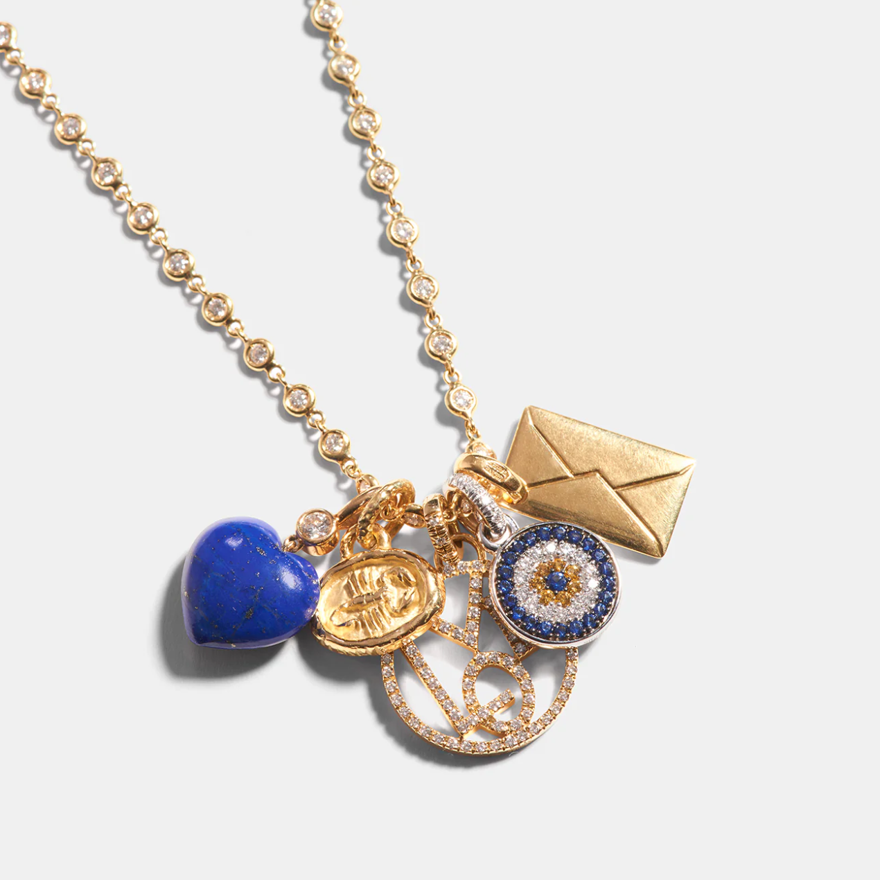 Evil Eye Charm With Diamonds & Sapphires