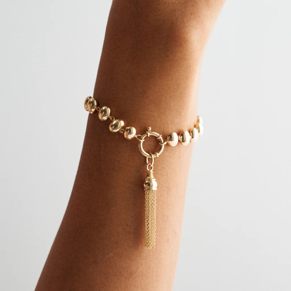 Golden Tassel Charm