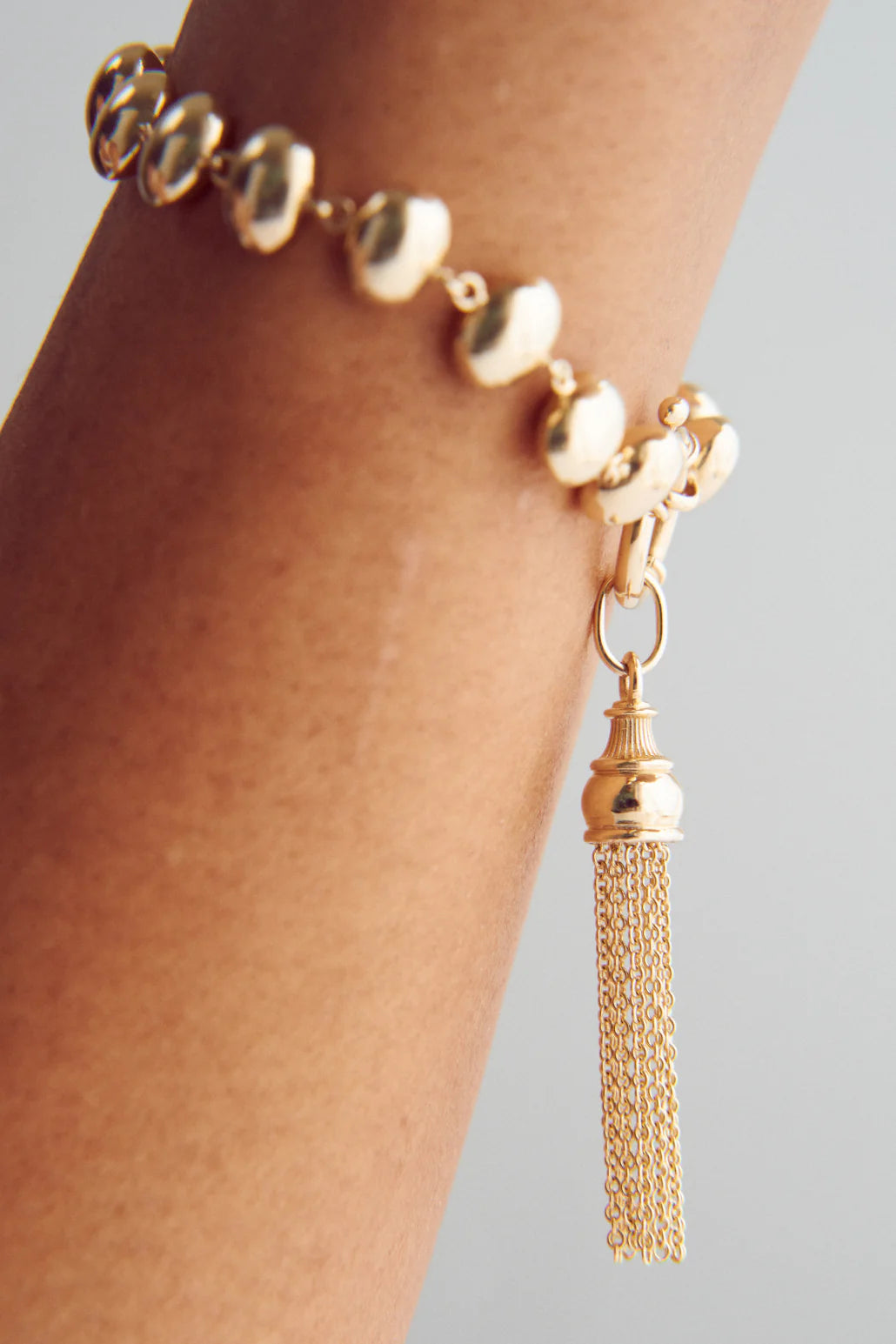 Golden Tassel Charm
